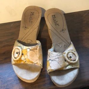 Woman’s sandals. Lighting is off… sorry… shoe is not faded